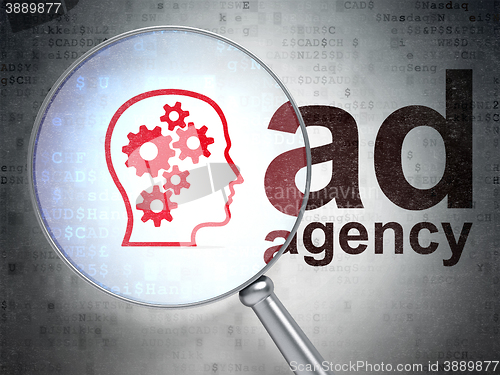 Image of Marketing concept: Head With Gears and Ad Agency with optical glass