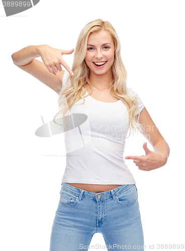 Image of happy young woman or teenage girl in white t-shirt