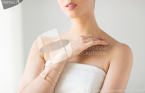 Image of close up of beautiful woman with ring and bracelet