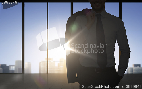Image of silhouette of business man over office background