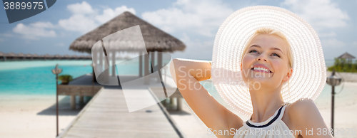 Image of beautiful woman enjoying summer over exotic beach