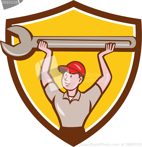 Image of Mechanic Lifting Wrench Crest Cartoon