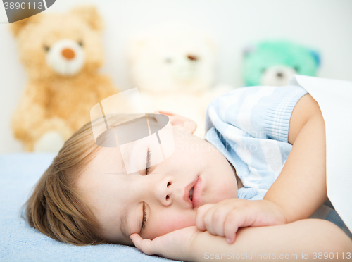 Image of Cute little boy is sleeping