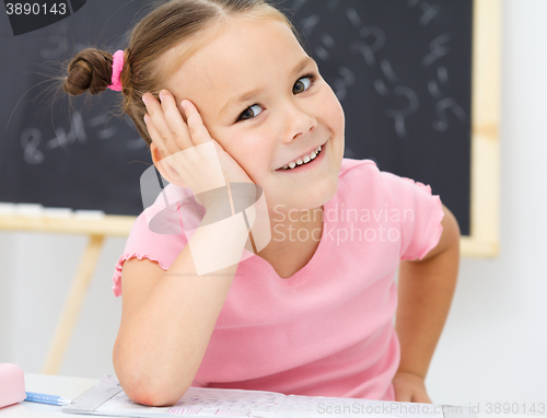 Image of Portrait of a little girl in school