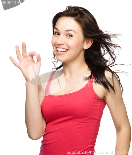 Image of Woman is showing OK sign