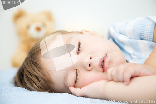 Image of Cute little boy is sleeping