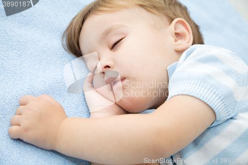 Image of Cute little boy is sleeping