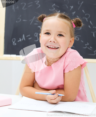 Image of Portrait of a little girl in school