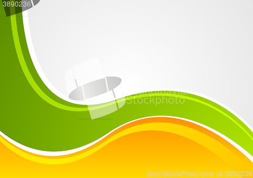 Image of Bright green and orange wavy corporate background