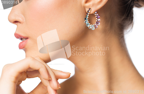 Image of close up of beautiful woman face with earring