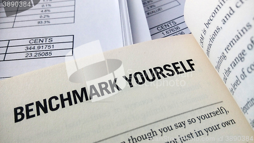 Image of Benchmark yourself word on the book 