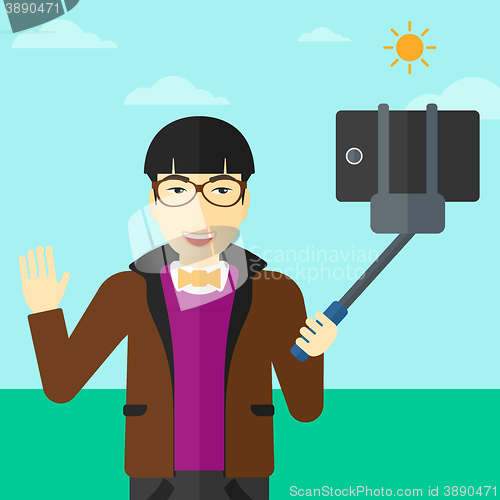 Image of Man making selfie.