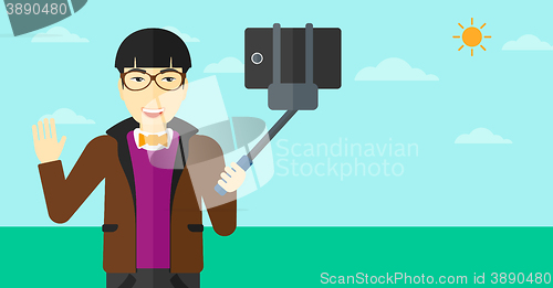 Image of Man making selfie.
