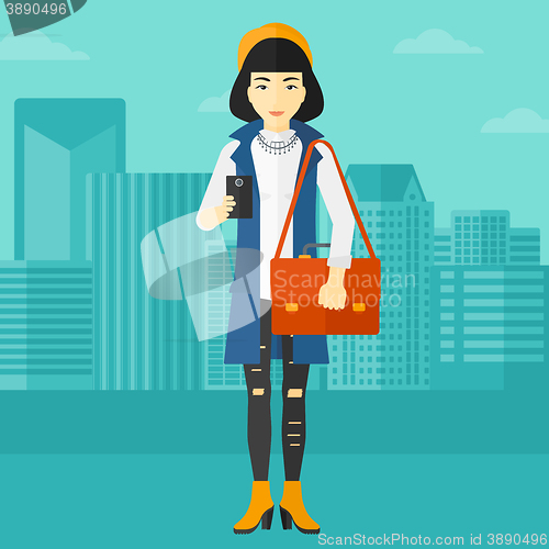 Image of Woman using smartphone.