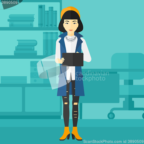 Image of Woman using tablet computer.