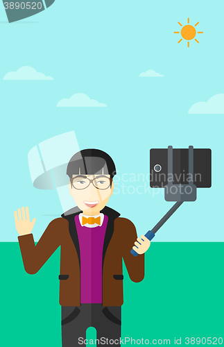Image of Man making selfie.