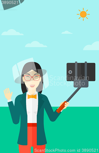 Image of Woman making selfie.