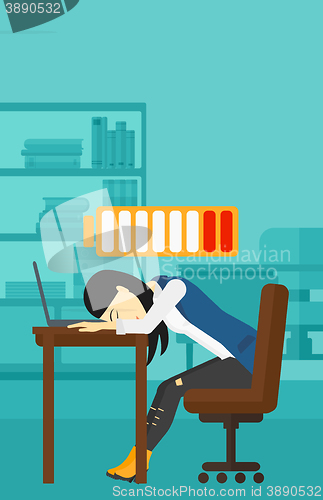 Image of Employee sleeping at workplace.