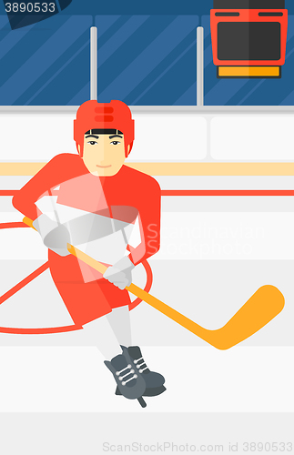 Image of Ice-hockey player with stick.