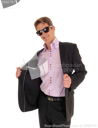 Image of Happy young man in suit.