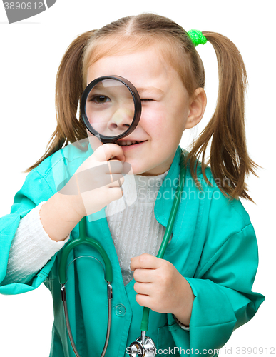 Image of Cute little girl is playing doctor