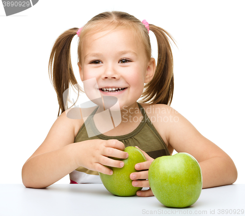 Image of Little girl with red apple