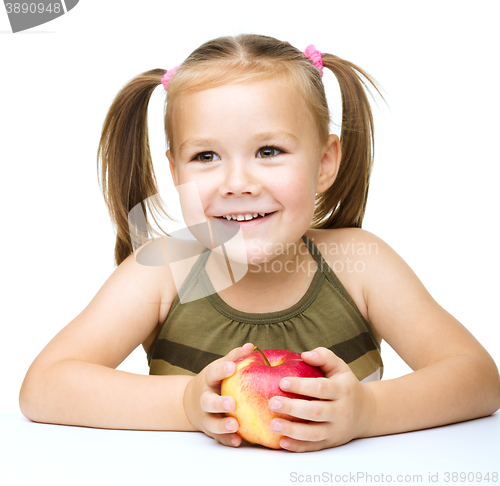 Image of Little girl with red apple