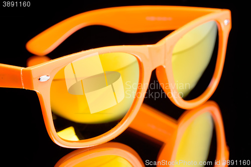 Image of colored sunglasses.