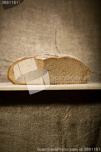 Image of A slice of bread with butter 