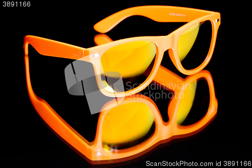 Image of colored sunglasses.