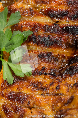 Image of plate of grilled meat with fries