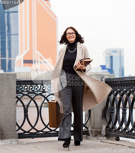 Image of woman in a bright coat