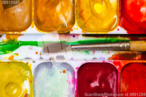 Image of vintage paint-box with brush