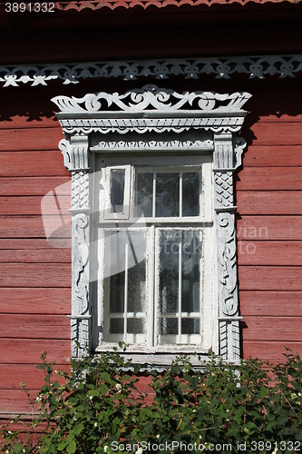 Image of carvings window log farmhouse  