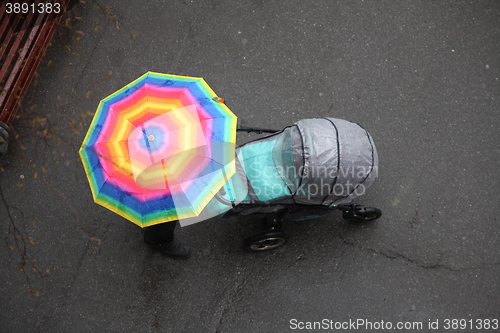 Image of Baby strollers and umbrella