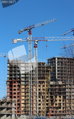 Image of  tower cranes on construction site