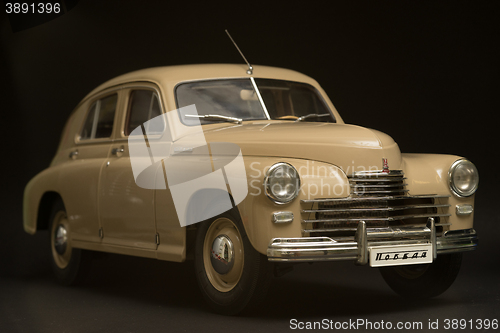 Image of retro car on a black background 