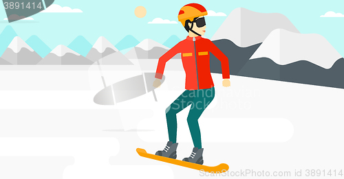Image of Young woman snowboarding.