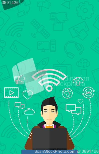 Image of Man working on laptop.