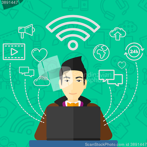 Image of Man working on laptop.