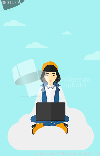 Image of Woman working on laptop.