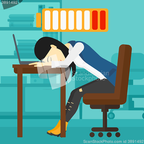 Image of Employee sleeping at workplace.