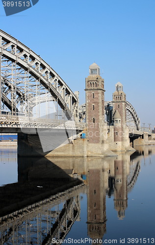 Image of  old bridge with beacon towers