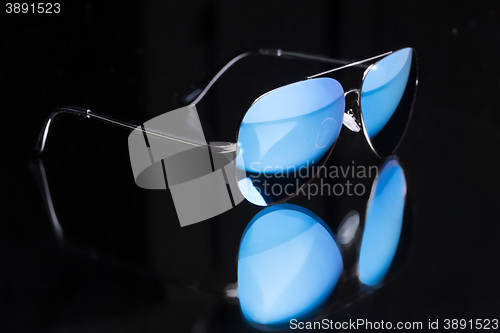 Image of colored sunglasses.