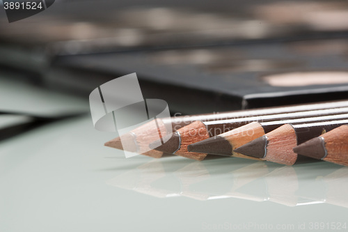 Image of shadows eye and eyebrow set on table