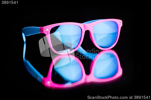 Image of colored sunglasses.