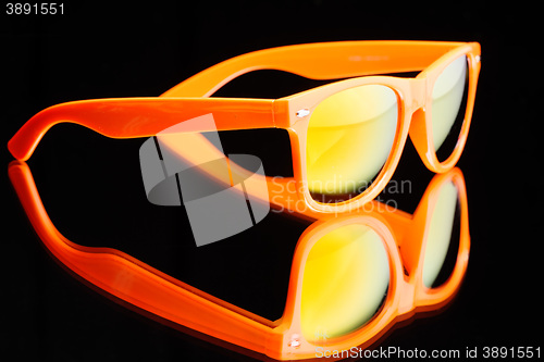 Image of colored sunglasses.