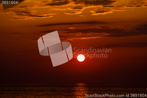 Image of red sunset over water