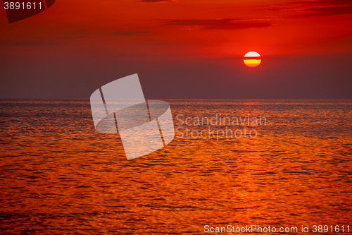 Image of red sunset over water