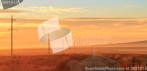Image of rural road at sunrise